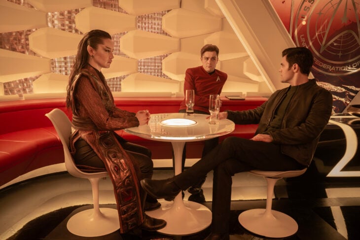 Christina Chong as La'an, Martin Quinn as Scotty, and Paul Wesley as Kirk on Star Trek: Strange New Worlds Season 3 Episode 8, "Four-and-a-Half Vulcans." Star Trek: Strange New Worlds Season 3 Episode 8 Review: Four-and-a-Half Vulcans - Part 99 