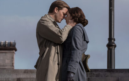 Outlander: Blood of my Blood 102 — S.W.A.K. (Sealed With a Kiss), Left to Right: Jeremy Irvine (“Henry Beauchamp”) and Hermione Corfield (“Julia Moriston Beauchamp”) Outlander: Blood of My Blood Season 1 Episode 2 Review: S.W.A.K. (Sealed With A Kiss) 