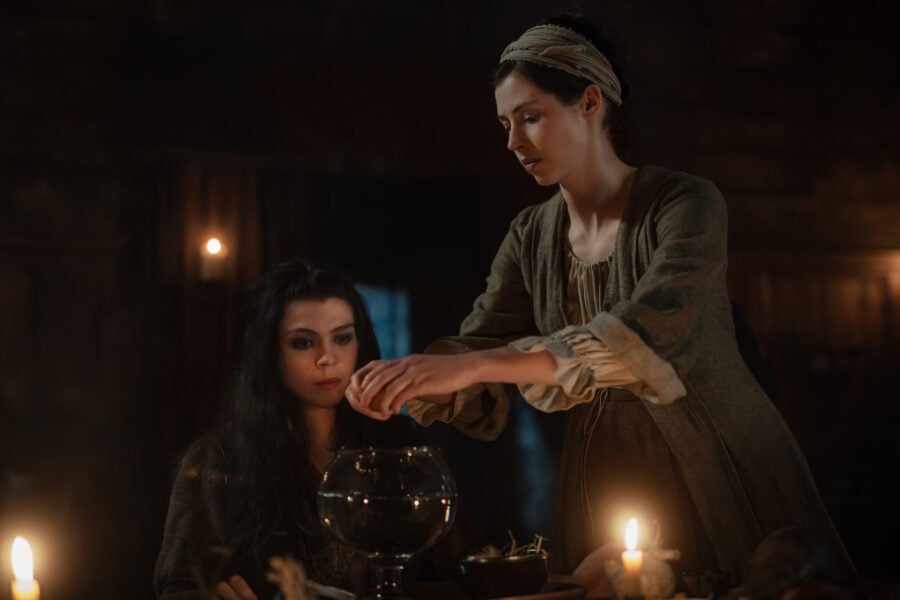 Outlander: Blood of my Blood 105 — Needfire, Left to Right: Sara Vickers (“Davina Porter”), Katharine O'Donnelly ("Maisri"), Hermione Corfield (“Julia Moriston Beauchamp”)