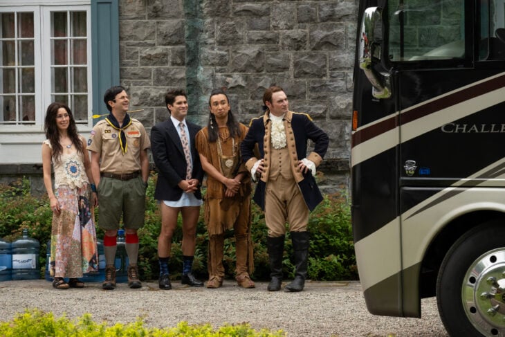 “Viking Wedding” – GHOSTS Season 5 Episode 2. Pictured (L-R): Sheila Carrasco as Flower, Richie Moriarty as Pete, Asher Grodman as Trevor, Román Zaragoza as Sasappis, and Brandon Scott Jones as Isaac. Photo: Bertrand Calmeau/CBS ©2025 CBS Broadcasting, Inc. All Rights Reserved.