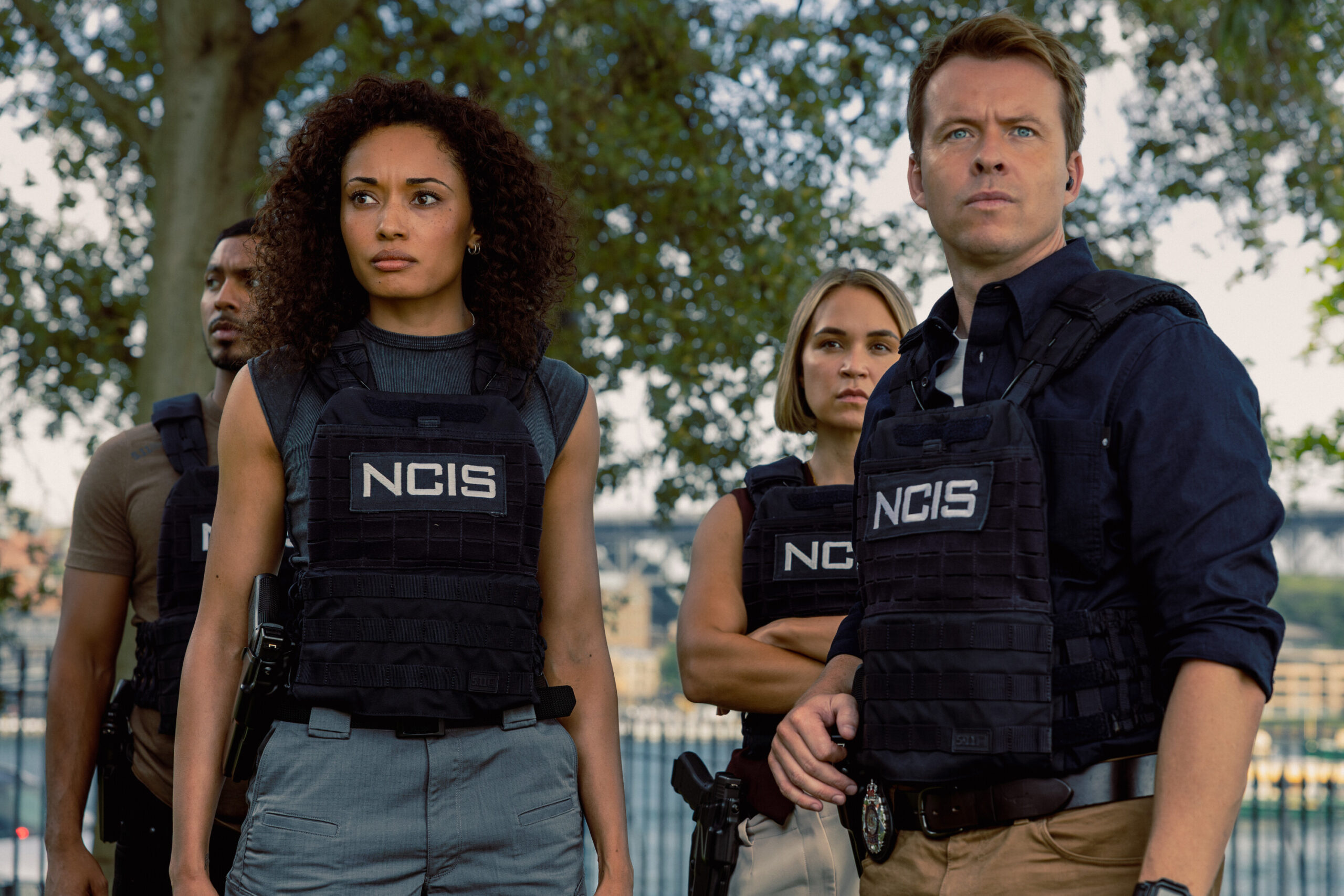 NCIS: Sydney Season 3 Episode 1, "Gut Instinct" -- Sean Sagar as NCIS Special Agent DeShawn Jackson, Olivia Swann as NCIS Special Agent Captain Michelle Mackey, Tuuli Narkle as AFP Liaison Officer Constable Evie Cooper and Todd Lasance as AFP Liaison Officer Sergeant Jim 'JD' Dempsey