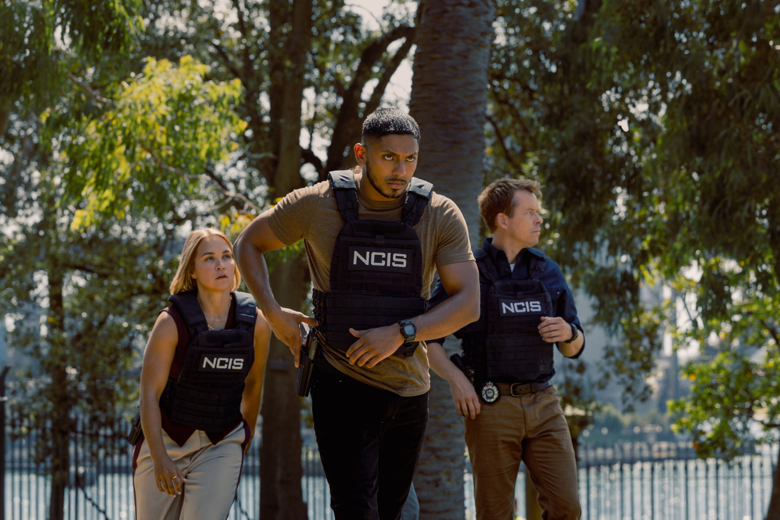 NCIS: Sydney Season 3 Episode 1, "Gut Instinct" -- uuli Narkle as AFP Liaison Officer Constable Evie Cooper, Sean Sagar as NCIS Special Agent DeShawn Jackson, and Todd Lasance as AFP Liaison Officer Sergeant Jim 'JD' Dempsey