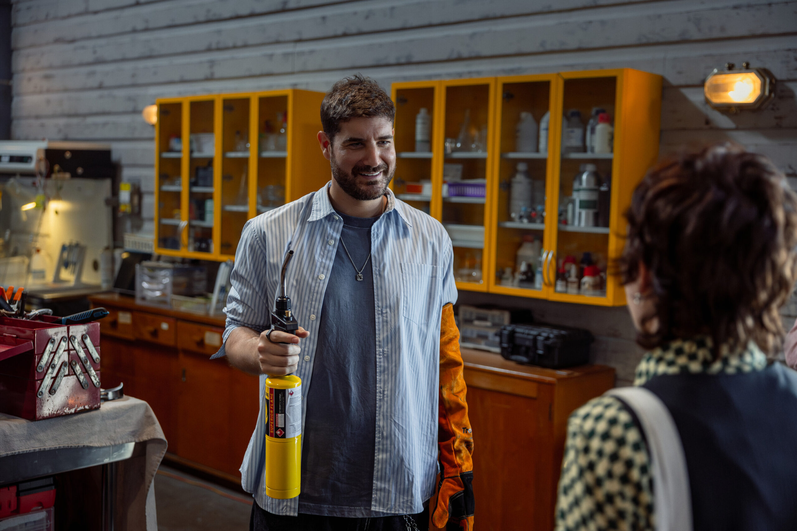 NCIS: Sydney Season 3, Episode 3, "Lost In Translation" -- Claude Jabbour as Travis “Trigger” Riggs and Mavournee Hazel as Forensic Pathologist Bluebird 'Blue' Gleeson