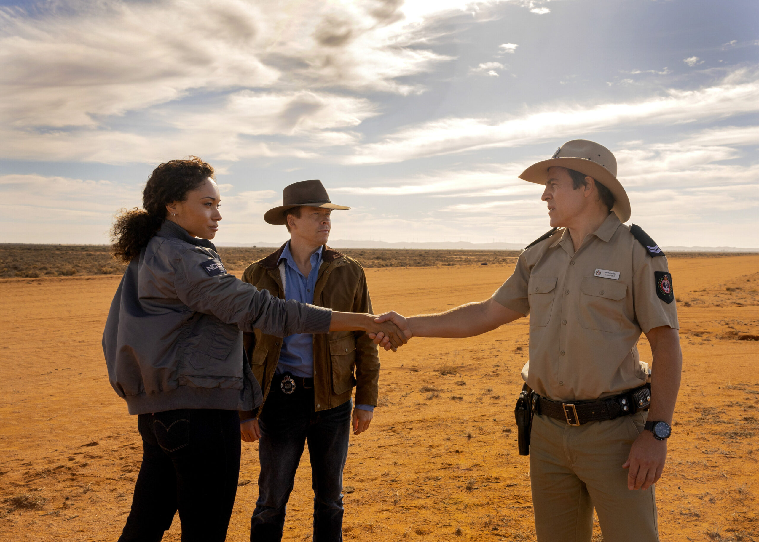 NCIS: Sydney Season 3 Episode 4, "The Truth Is Outback" -- Olivia Swann as NCIS Special Agent Captain Michelle Mackey, Todd Lasance as AFP Liaison Officer Sergeant Jim 'JD' Dempsey and Stephen Peacocke as Karl Drysdale