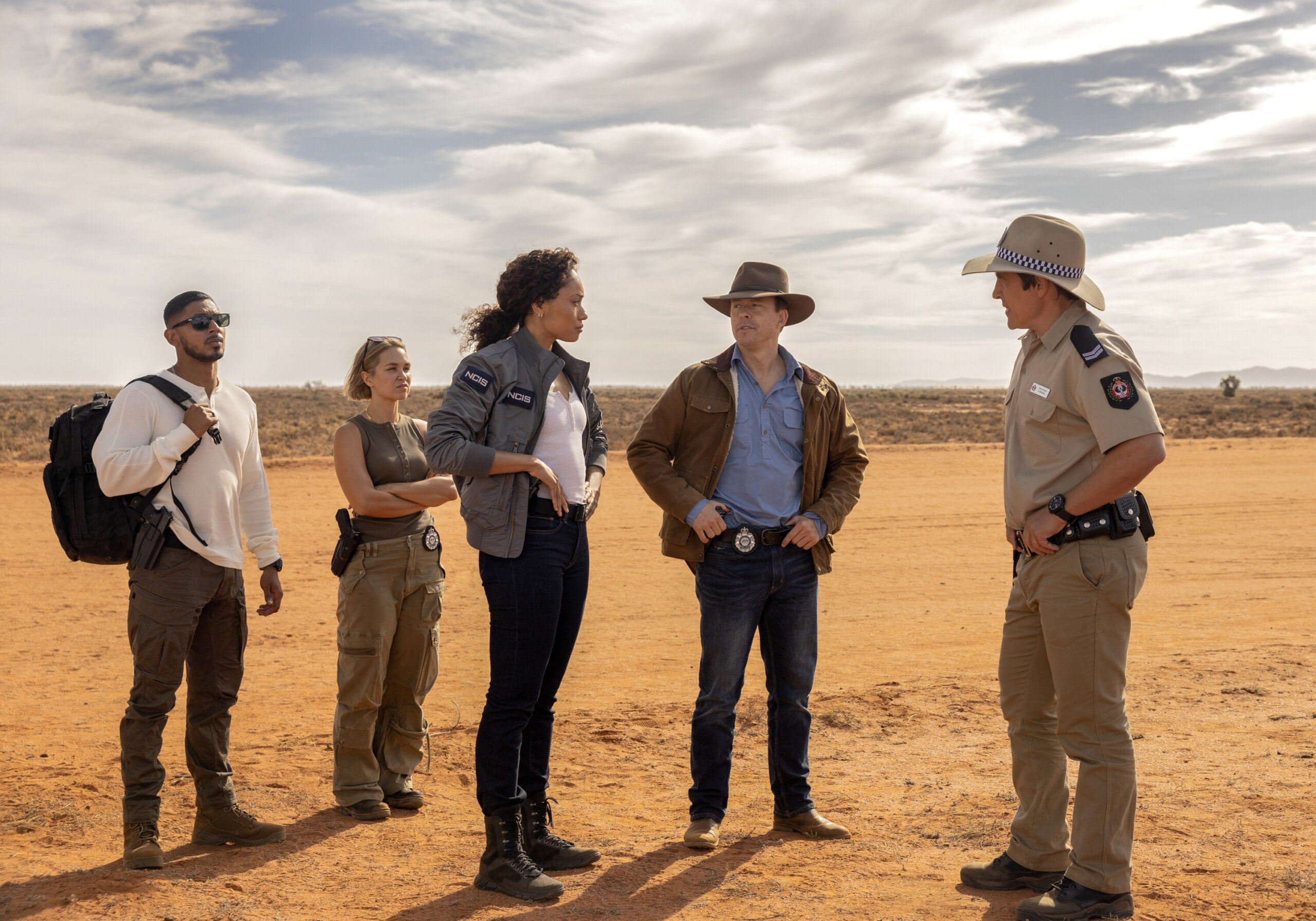 NCIS: Sydney Season 3 Episode 4, "The Truth Is Outback" -- Sean Sagar as NCIS Special Agent DeShawn Jackson, Tuuli Narkle as AFP Liaison Officer Constable Evie Cooper, Olivia Swann as NCIS Special Agent Captain Michelle Mackey, Todd Lasance as AFP Liaison Officer Sergeant Jim 'JD' Dempsey and Stephen Peacocke as Karl Drysdale