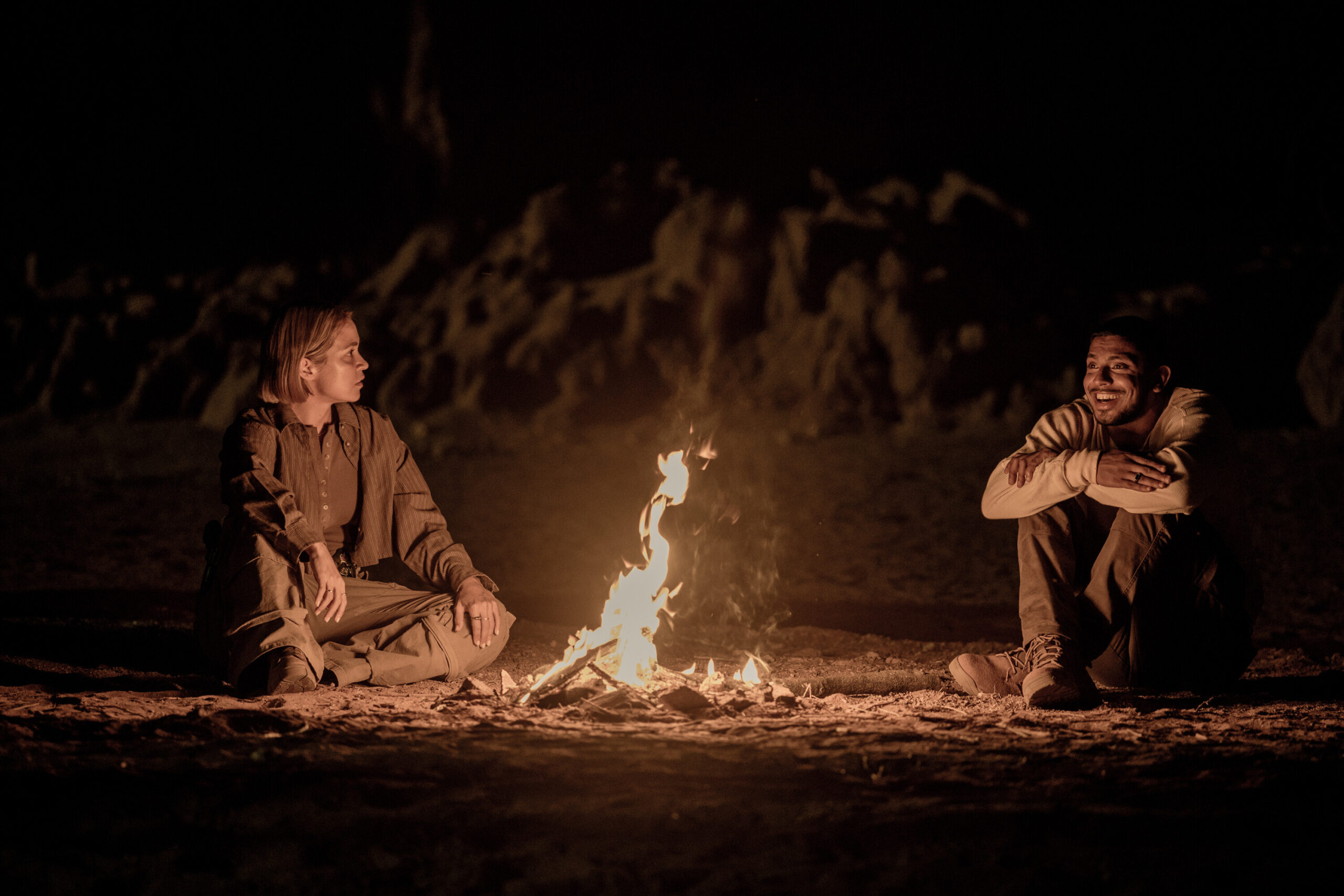 NCIS: Sydney Season 3 Episode 4, "The Truth Is Outback" -- Tuuli Narkle as AFP Liaison Officer Constable Evie Cooper and Sean Sagar as NCIS Special Agent DeShawn Jackson