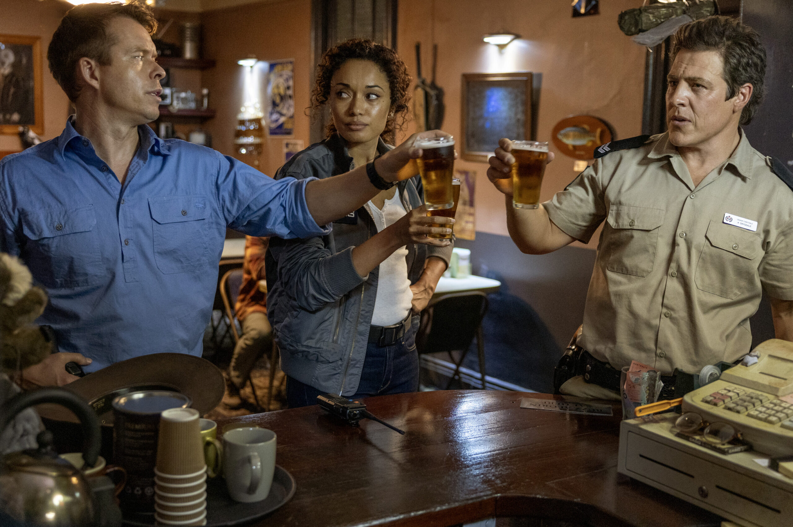 NCIS: Sydney Season 3 Episode 4, "The Truth Is Outback" -- Todd Lasance as AFP Liaison Officer Sergeant Jim 'JD' Dempsey, Olivia Swann as NCIS Special Agent Captain Michelle Mackey and Stephen Peacocke as Karl Drysdale