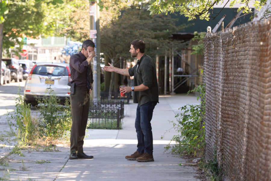 Law & Order Season 25 Episode 6, "Brotherly Love" - (l-r) Reid Scott as Detective Vincent Riley and Ryan Eggold as Matt Riley