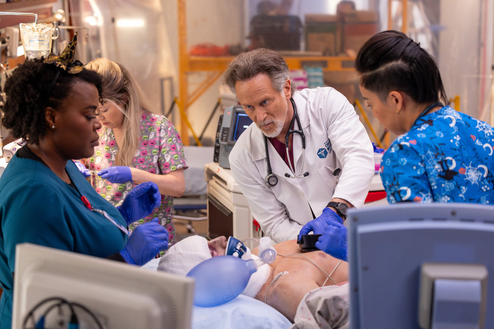 Chicago Med Season 11 Episode 5, "What's Hiding in the Dark" - (l-r) Steven Weber as Dr. Dean Archer and Lynnette Li as Nurse Nancy