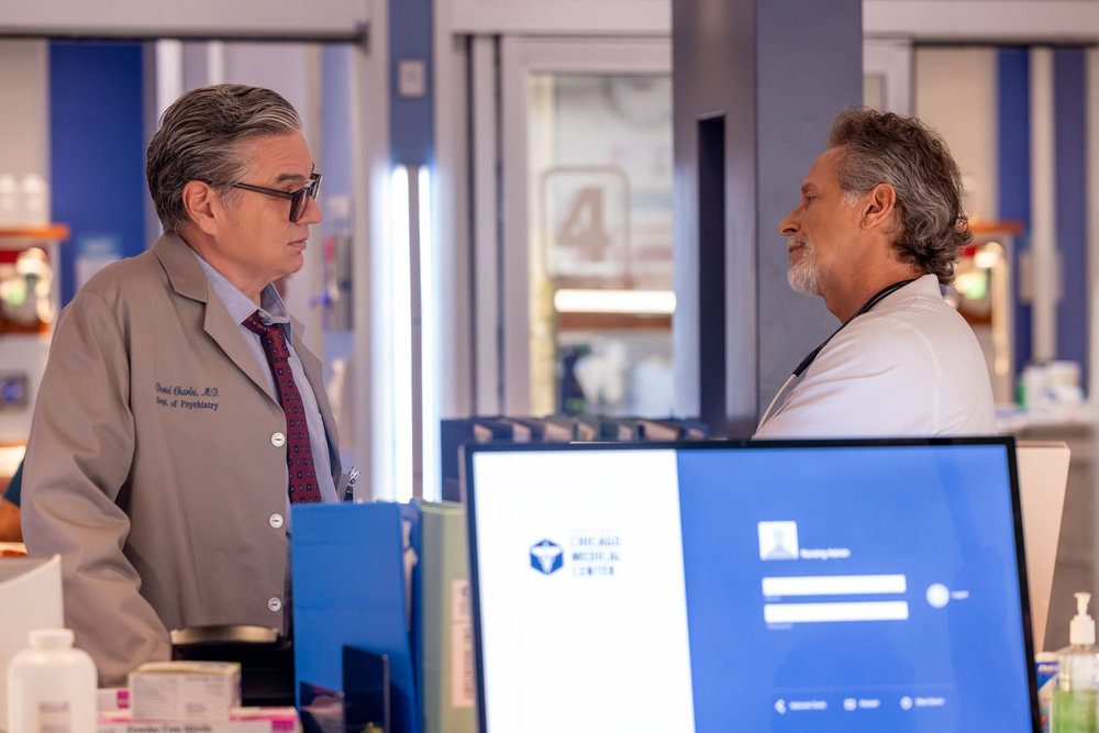 Chicago Med Season 11 Episode 5, "What's Hiding in the Dark" - (l-r) Oliver Platt as Dr. Daniel Charles and Steven Weber as Dr. Dean Archer