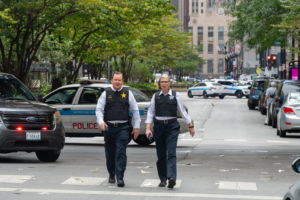 Chicago P.D. Season 13 Episode 5, "Miami" - (l-r) Joel Murray as Commander Delvin and Amy Morton as Desk Sgt. Trudy Platt