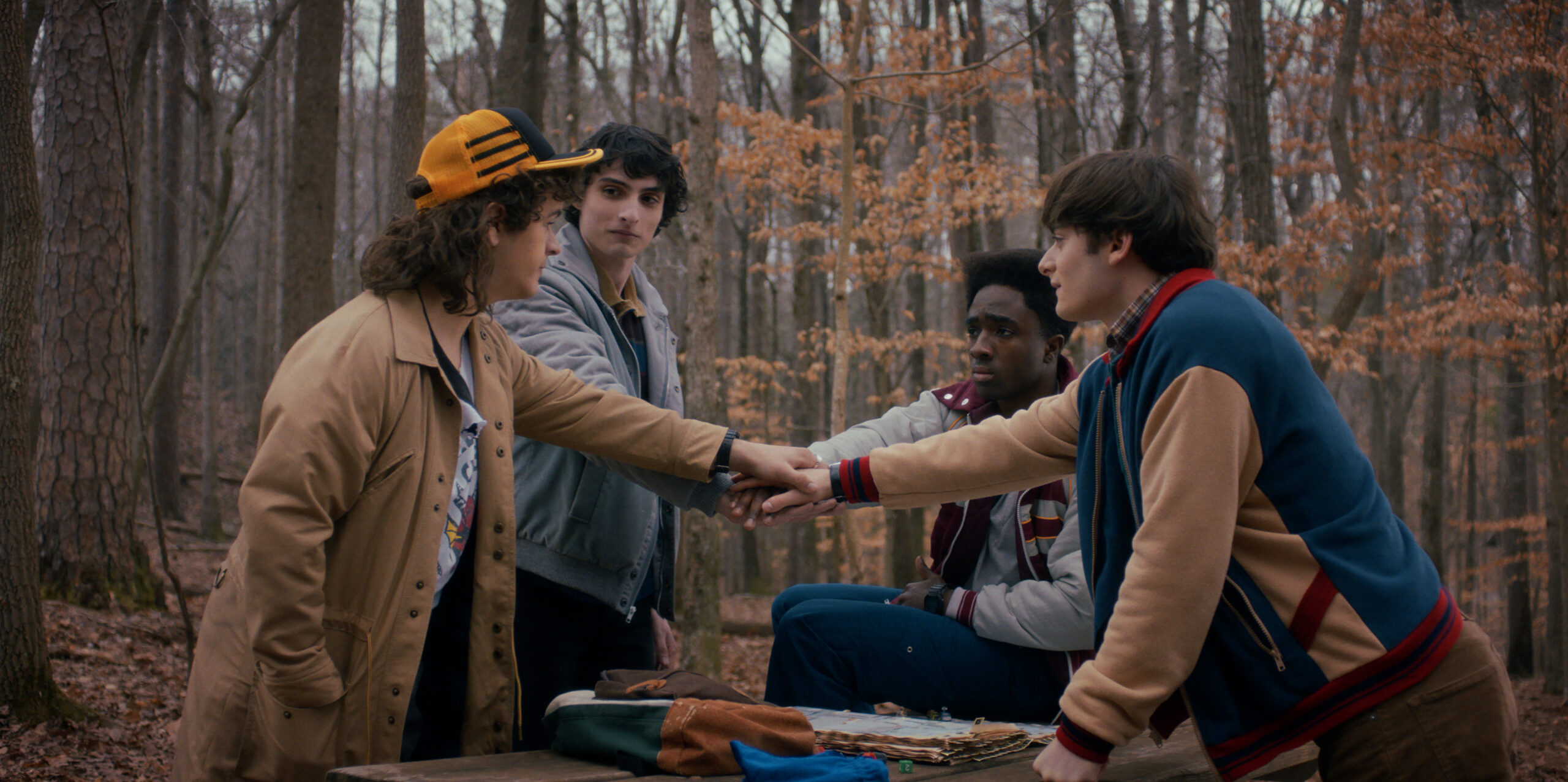 Stranger Things Season 5 -- Gaten Matarazzo as Dustin Henderson, Finn Wolfhard as Mike Wheeler, Caleb McLaughlin as Lucas Sinclair, and Noah Schnapp as Will Byers