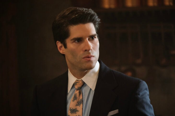 “T-Daddy” – GHOSTS. Pictured (L-R): Asher Grodman as Trevor. Photo: Bertrand Calmeau/CBS ©2025 CBS Broadcasting, Inc. All Rights Reserved. | Tell-Tale TV “T-Daddy” – GHOSTS. Pictured (L-R): Asher Grodman as Trevor. Photo: Bertrand Calmeau/CBS ©2025 CBS Broadcasting, Inc. All Rights Reserved. Ghosts: Asher Grodman On the Fun of Playing a “Deeply Unqualified” Father