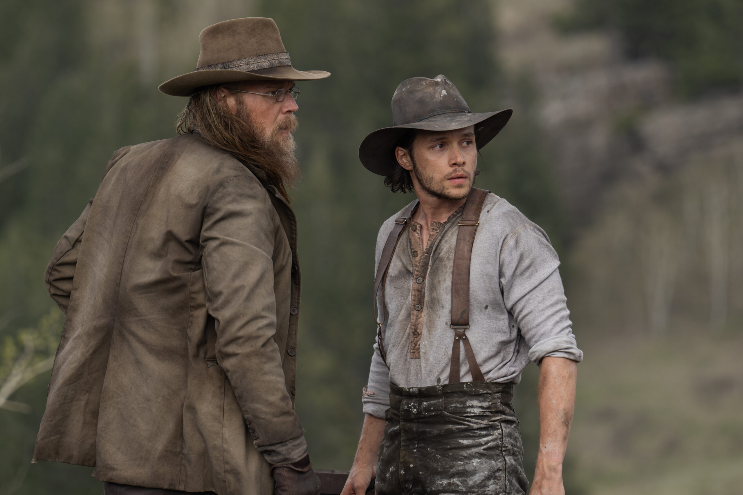 Still from The Abandons Season 1 Episode 1 of Ryan Hurst as Miles Alderton, and Nick Robinson as Elias Teller pictured from left to right.