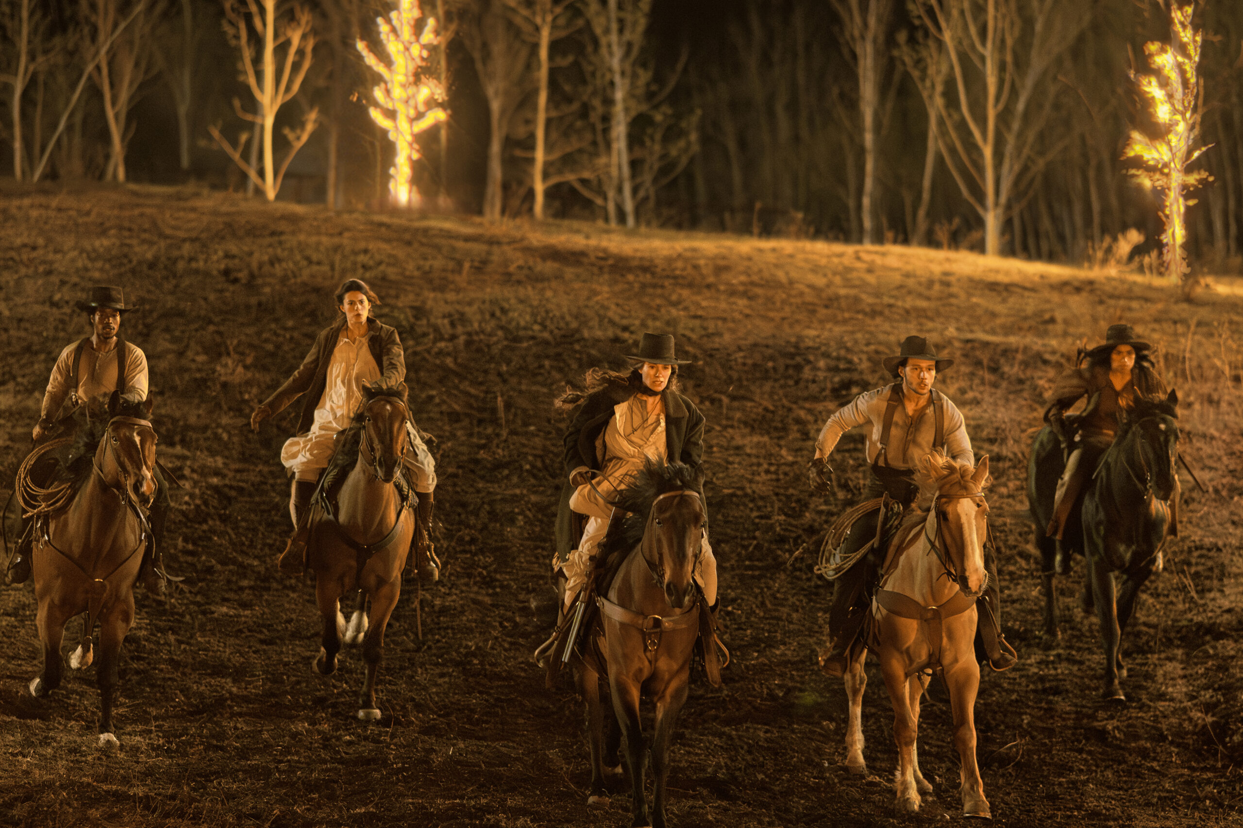 Still from The Abandons Season 1 Episode 1 of Lamar Johnson as Albert Mason, Diana Silvers as Dahlia Teller, Lena Headey as Fiona Nolan, Nick Robinson as Elias Teller, and Natalia del Riego as Lilla Belle pictured from left to right.