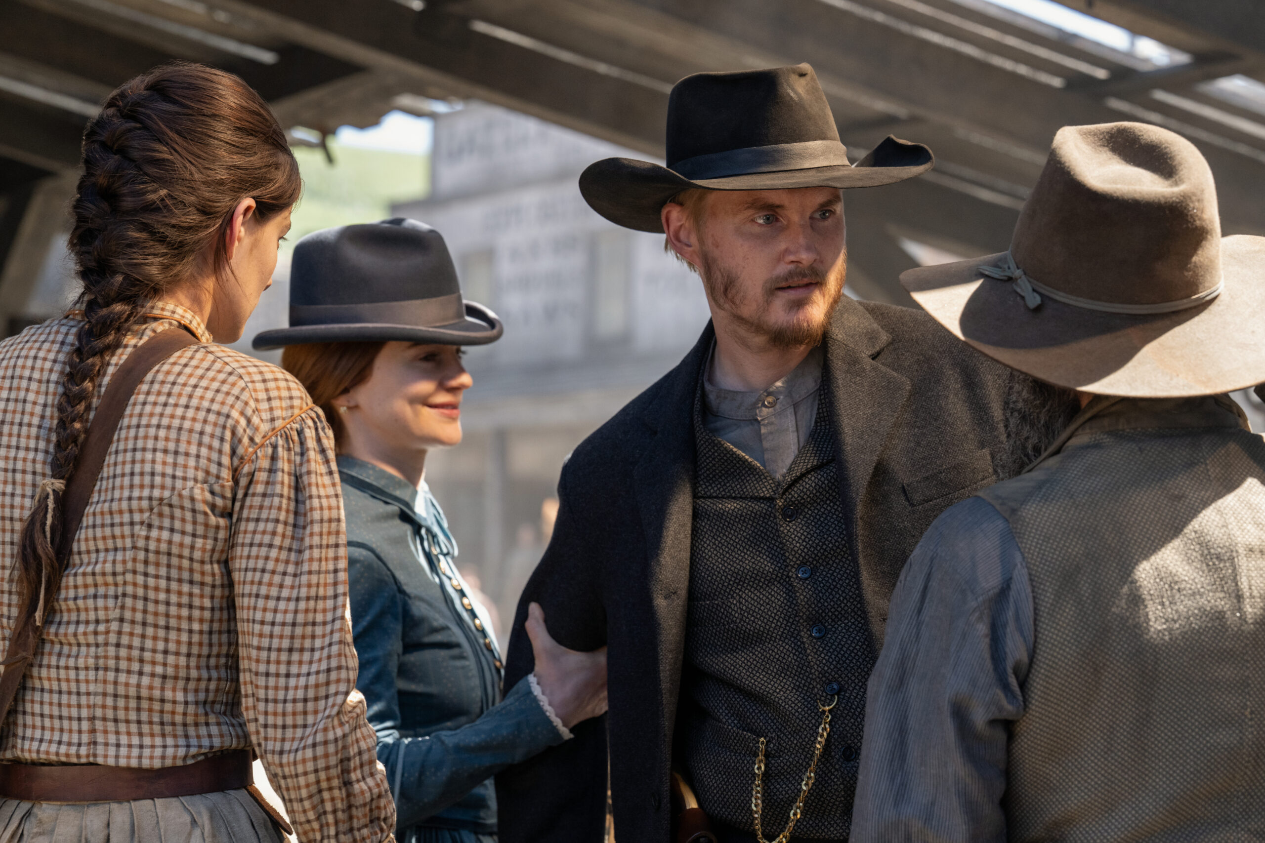Still from The Abandons Season 1 Episode 1 of iana Silvers as Dahlia Teller, Aisling Franciosi as Trisha Van Ness, and Toby Hemingway as Willem Van Ness pictured from left to right.