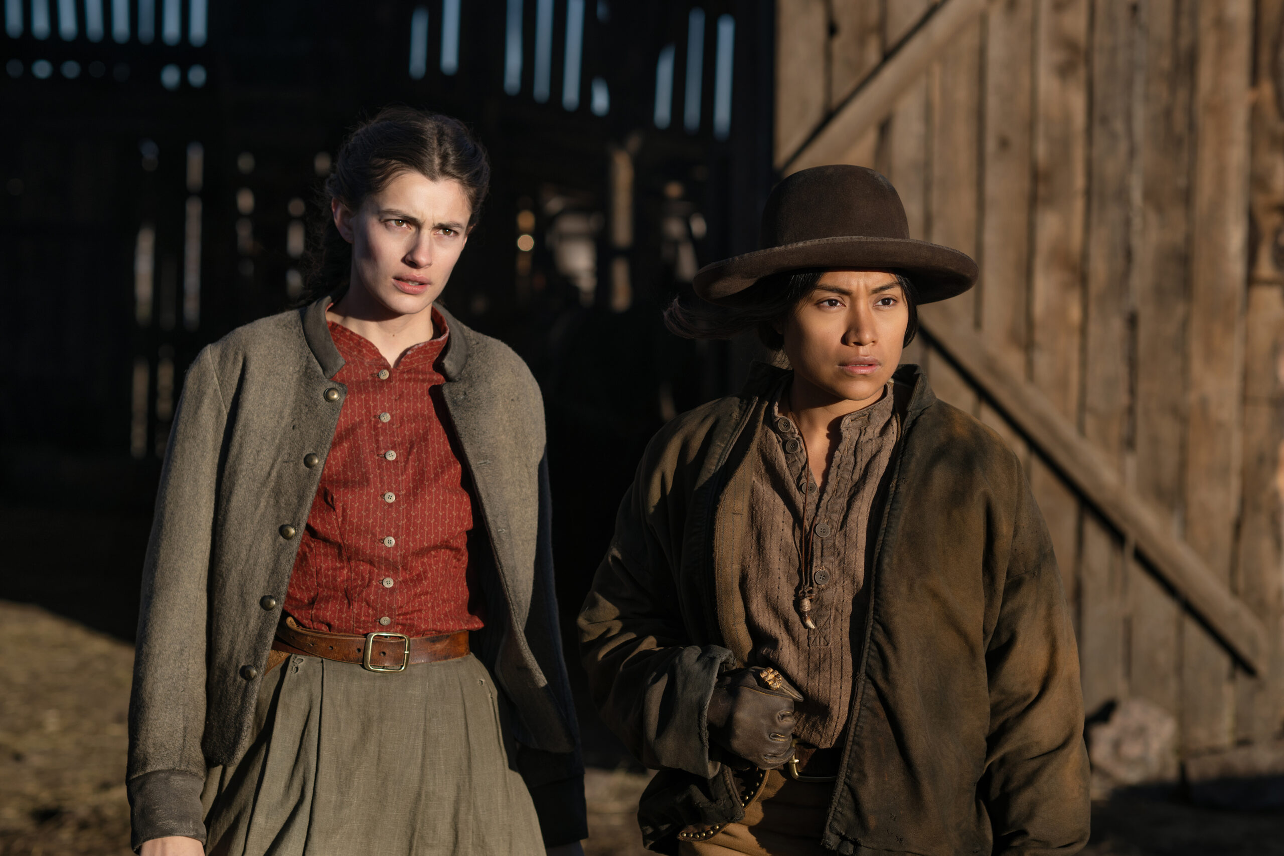 Still from The Abandons Season 1 Episode 7 of Diana Silvers as Dahlia Teller and Natalia del Riego as Lilla Belle pictured from left to right.