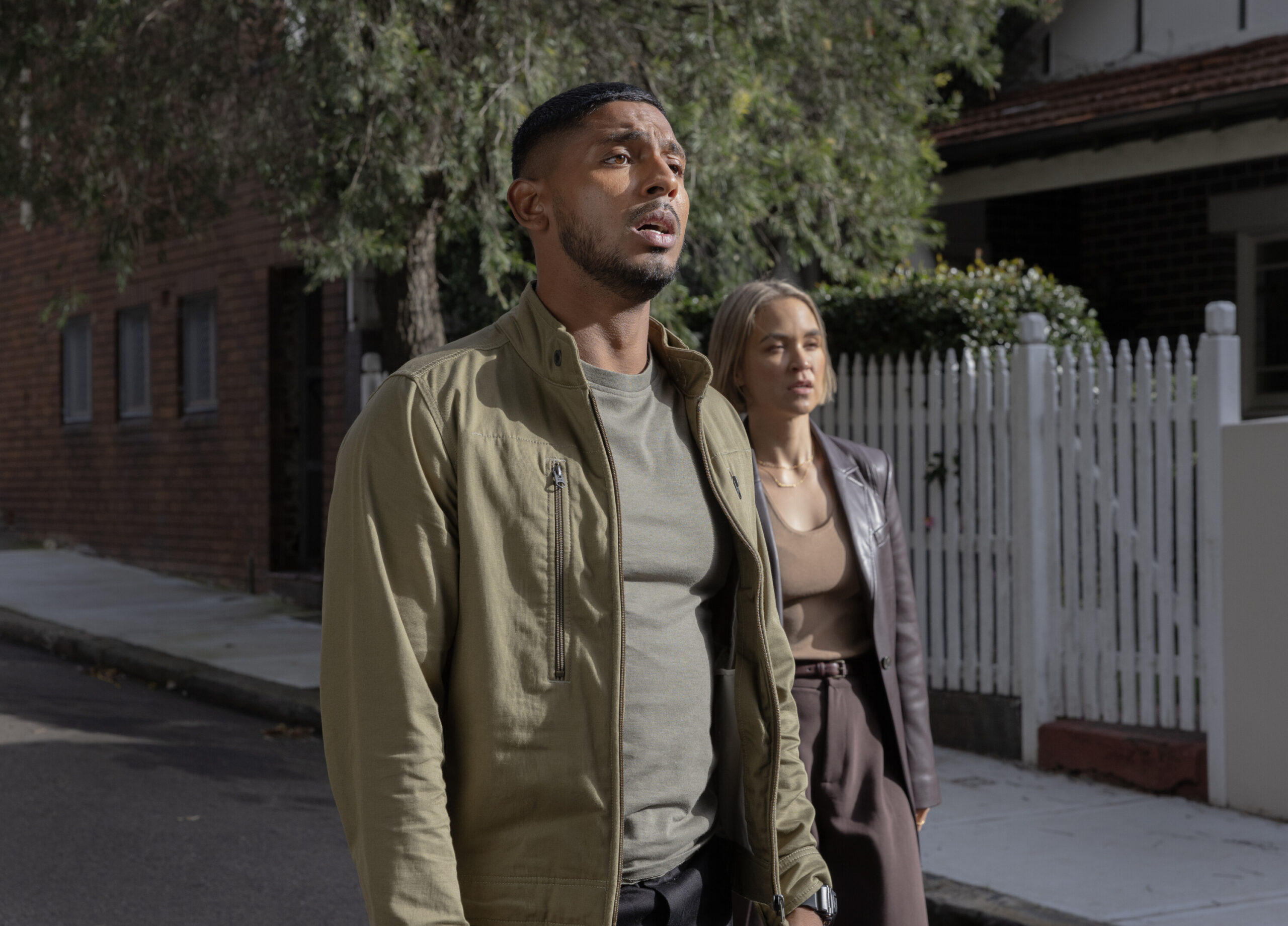 NCIS: Sydney Season 3 Episode 5, "Black Is White" -- Sean Sagar as NCIS Special Agent DeShawn Jackson and Tuuli Narkle as AFP Liaison Officer Constable Evie Cooper