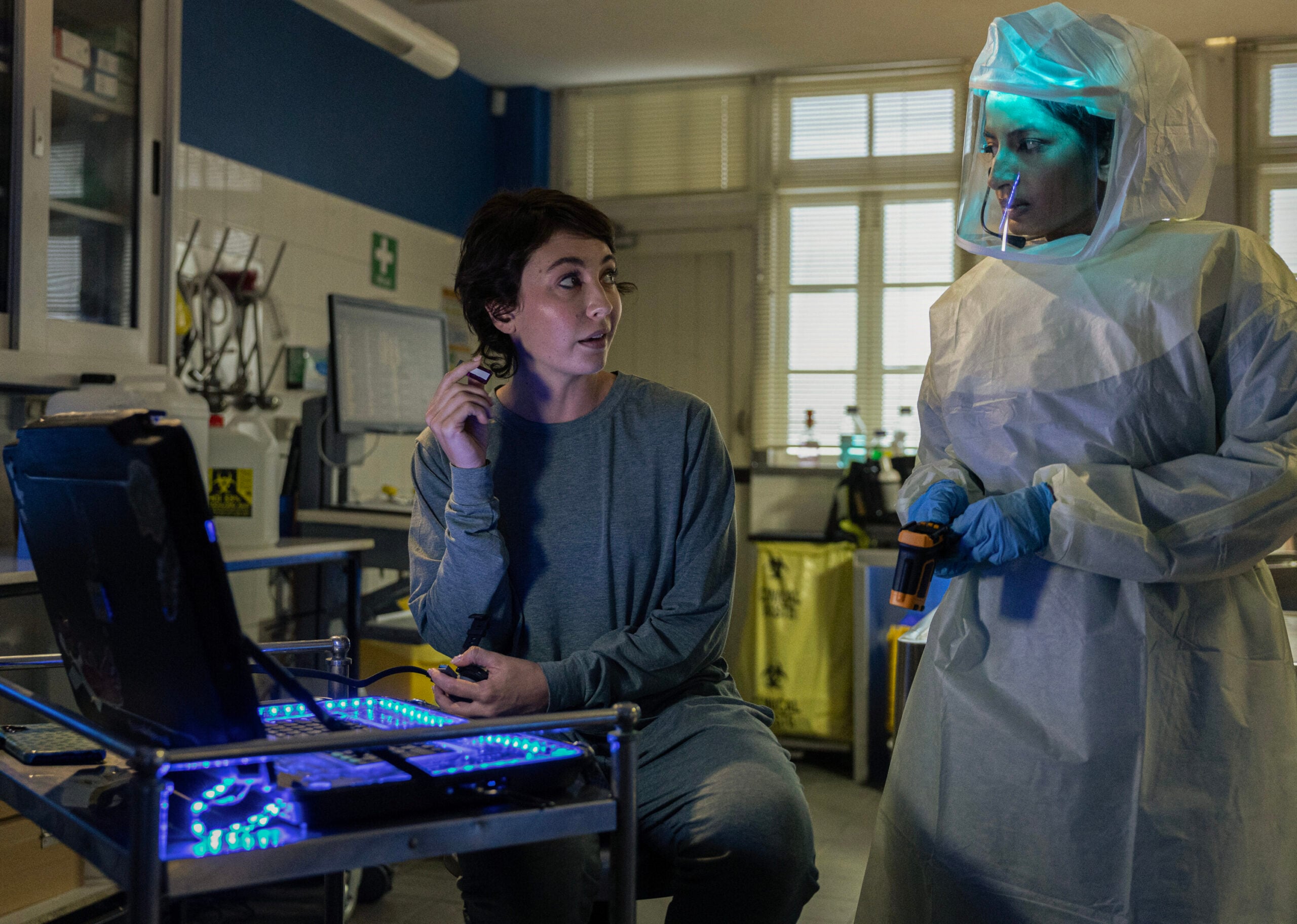 NCIS: Sydney Season 3 Episode 6, "Sucker Punch" -- Mavournee Hazel as Forensic Pathologist Bluebird 'Blue' Gleeson and Monica Kumar as Cara Ashwin