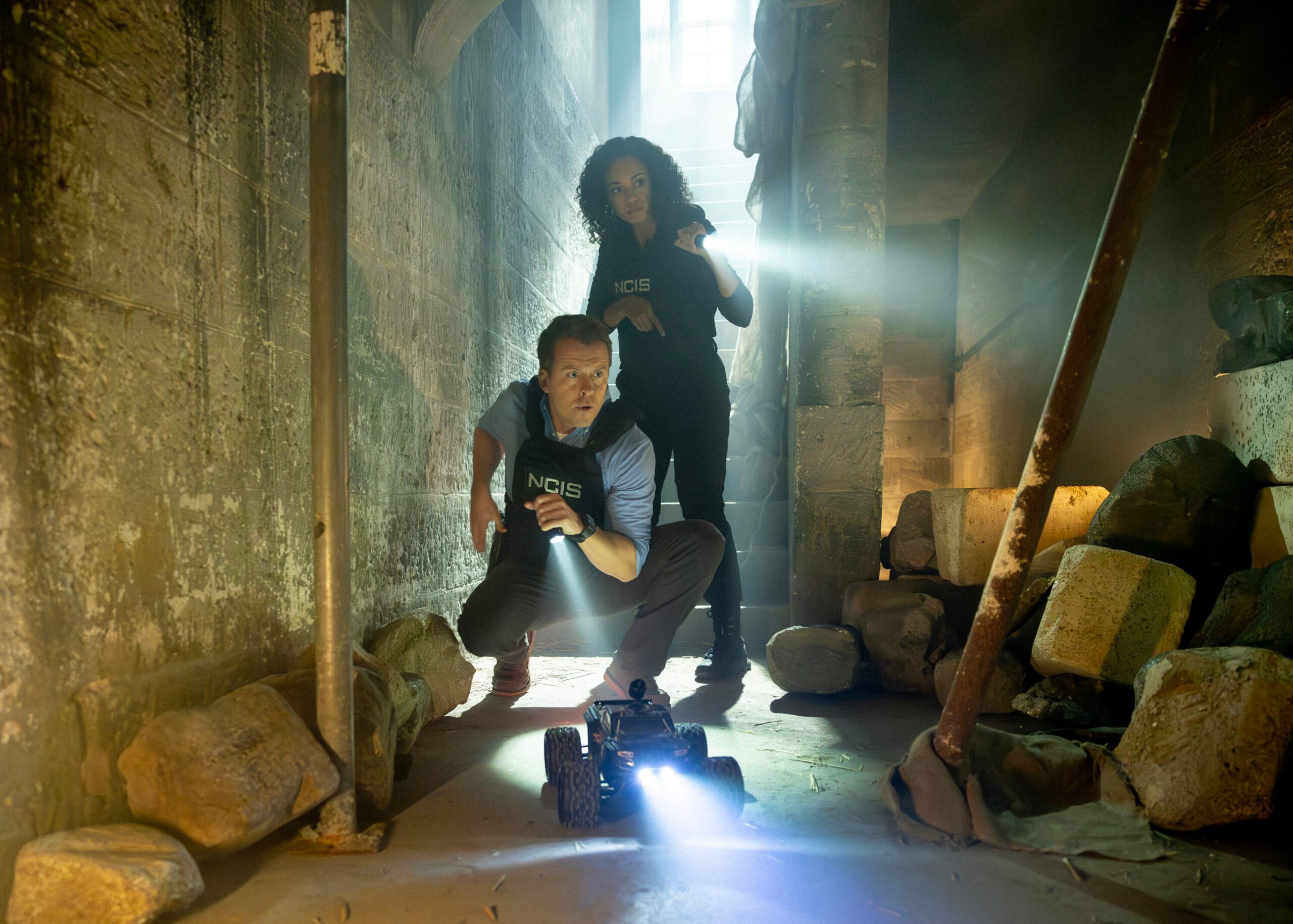 NCIS: Sydney Season 3 Episode 7, "Gold Digger" -- Todd Lasance as AFP Liaison Officer Sergeant Jim 'JD' Dempsey and Olivia Swann as NCIS Special Agent Captain Michelle Mackey