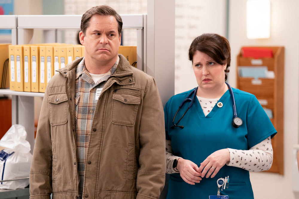 St. Denis Medical Season 2 Episode 3, "Get Me in The Pod," - (l-r) Kyle Bornheimer as Tim and Allison Tolman as Alex