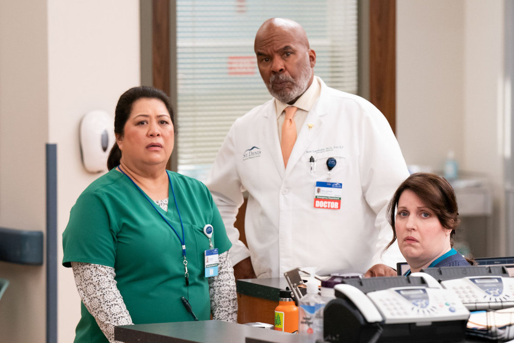 St. Denis Medical - Season 2 | Tell-Tale TV St. Denis Medical Season 2 Episode 5, "A Strong Cup of Coffee," - (l-r) Kaliko Kauahi as Val, David Alan Grier as Dr. Ron, and Allison Tolman as Alex