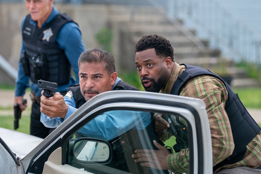 Chicago P.D. Season 13 Episode 6, "Send Me" - (l-r) Eddie Fernandez as Patrol Officer and LaRoyce Hawkins as Officer Kevin Atwater