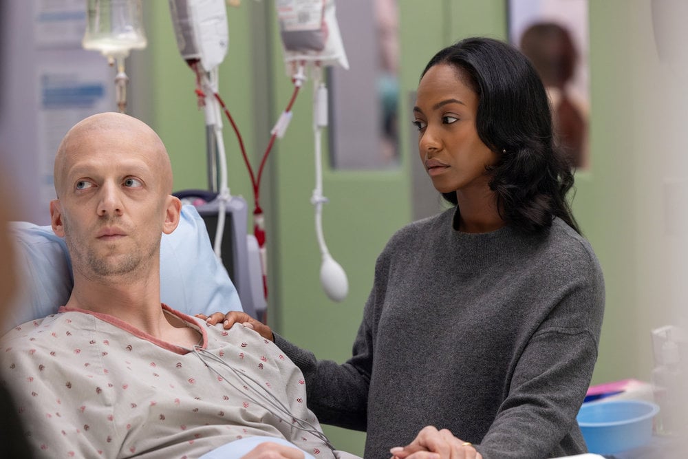 Chicago Med Season 11 Episode 7, "Double Down," - (l-r) Zach Appelman as Jeremy Lockhart and Tetona Jackson as Esme Lockhart