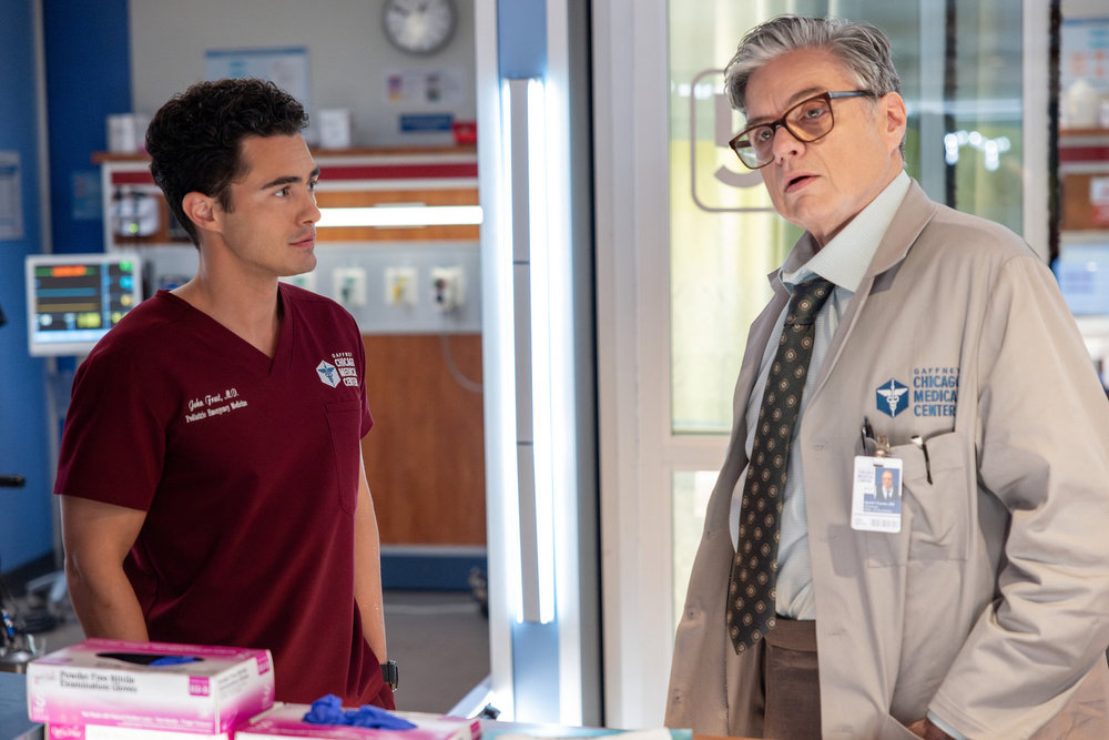 Chicago Med Season 11 Episode 7, "Double Down," - (l-r) Darren Barnet as Dr. John Frost and Oliver Platt as Dr. Daniel Charles