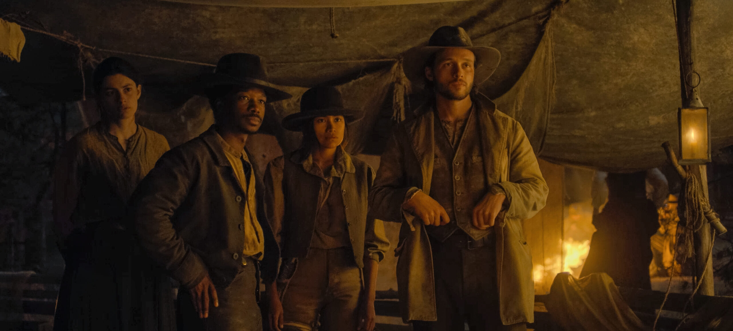 Still from the Abandons Season 1 Episode 3 of Diana Silvers as Dahlia Teller, Lamar Johnson as Albert Mason, Natalia del Riego as Lilla Belle, and Nick Robinson as Elias Teller pictured from left to right.