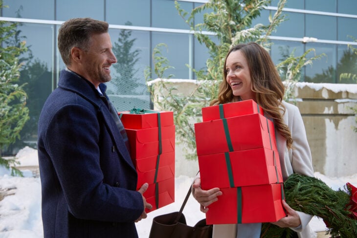 The More the Merrier - Photo: Brendan Penny, Rachel Boston (Credit: ©2025 Hallmark Media/Photographer: Allister Foster) | Tell-Tale TV The More the Merrier - Photo: Brendan Penny, Rachel Boston (Credit: ©2025 Hallmark Media/Photographer: Allister Foster) The More the Merrier Review: Not the Perfect Holiday Medicine