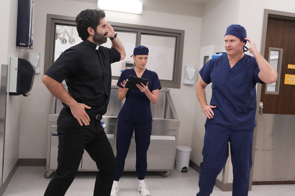 Stephen Schneider as Steve, Ariana Madix as Dr. Emerson, and Josh Lawson as Bruce on St. Denis Medical Season 2 Episode 6, "I Left a Woman on the Table."