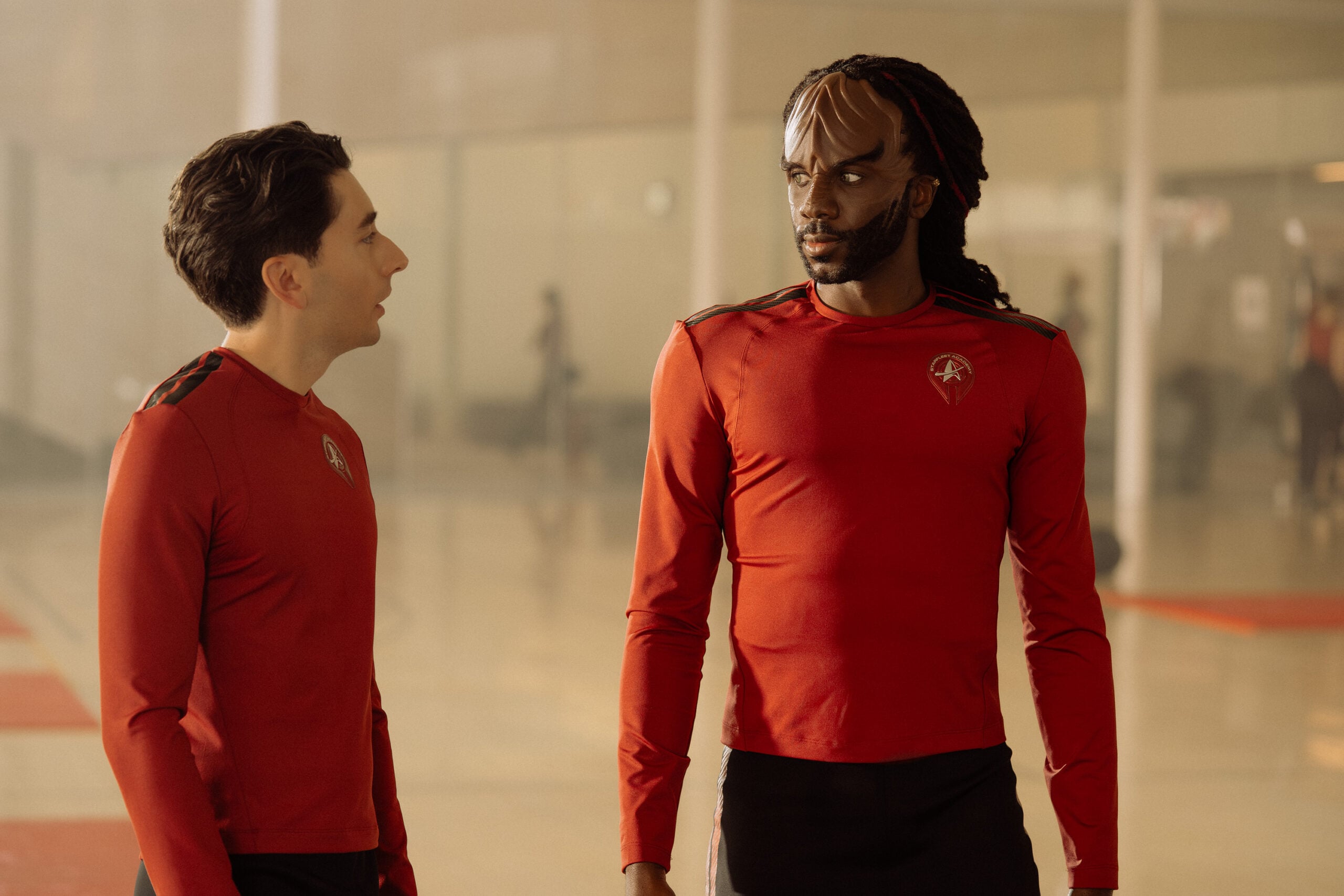 Still from Star Trek: Starfleet Academy Season 1 Episode 3 of Romeo Carere as Ocam and Karim Diane as Jay-Den pictured from left to right.