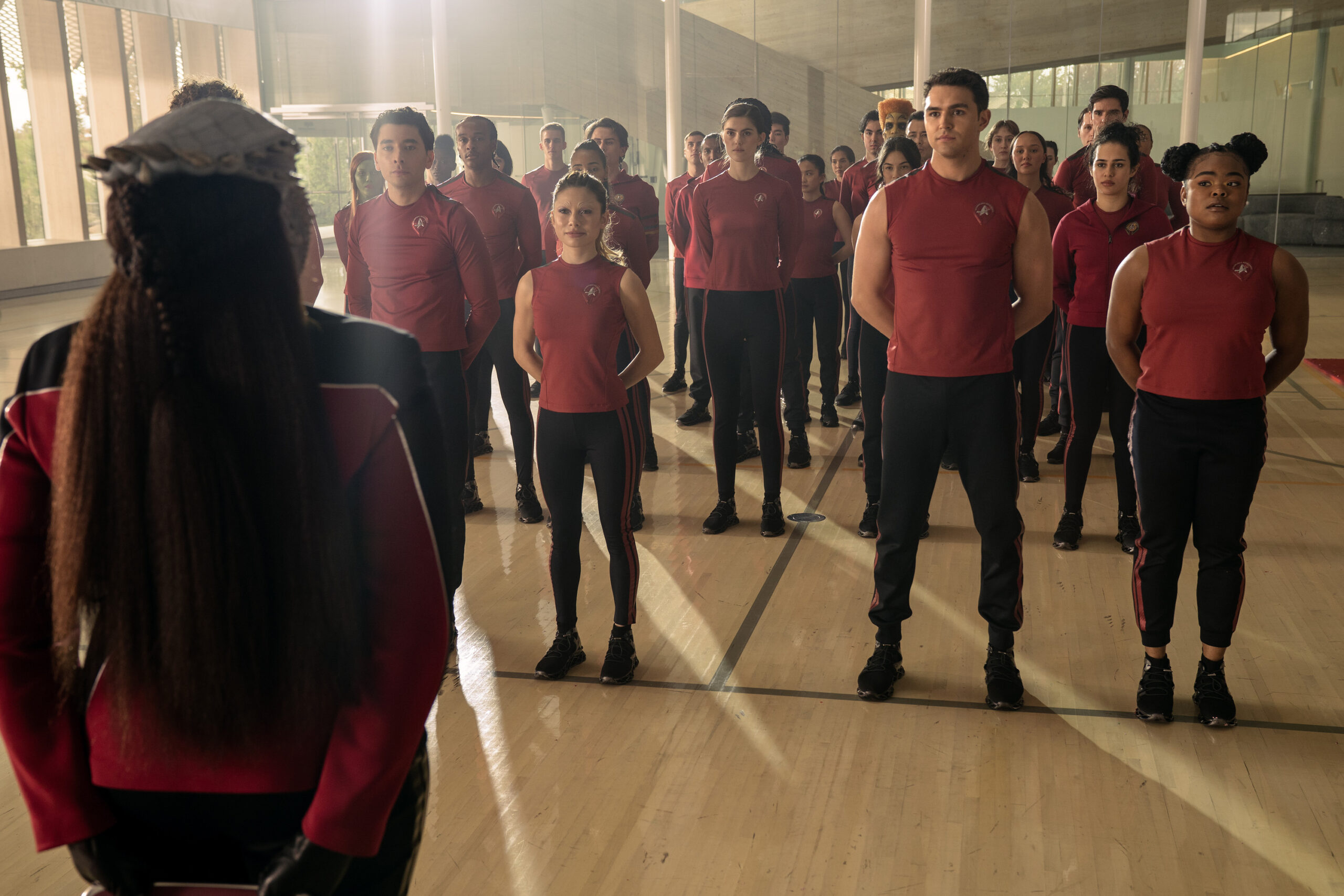 Still from Star Trek: Starfleet Academy of Romeo Carere as Ocam Sadal, Bella Shepard as Genesis Lythe, George Hawkins as Darem Reymi and Kerrice Brooks as Sam pictured from left to right.