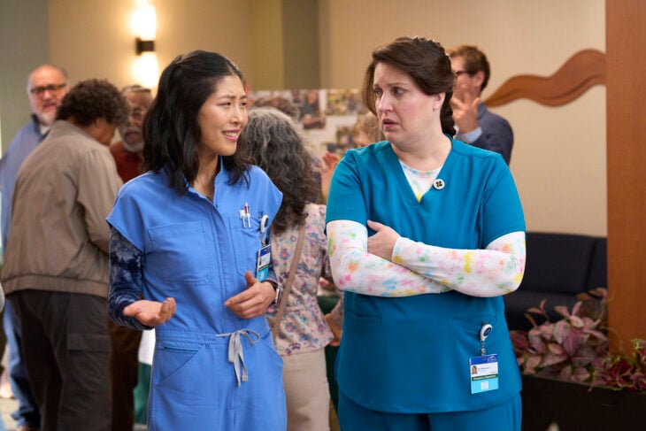 Kahyun Kim as Serena and Allison Tolman as Alex on St. Denis Medical Season 2 Episode 11, "This Isn't Bingo." St. Denis Medical Season 2 Episode 11 Review: This Isn’t Bingo 