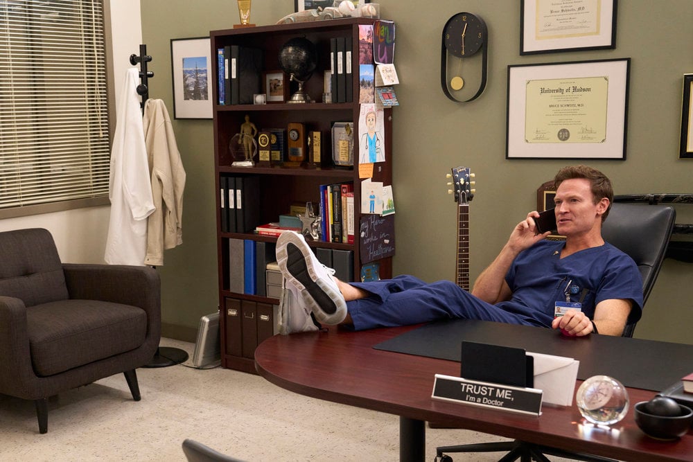 Josh Lawson as Bruce on St. Denis Medical Season 2 Episode 11, This Isn't Bingo.