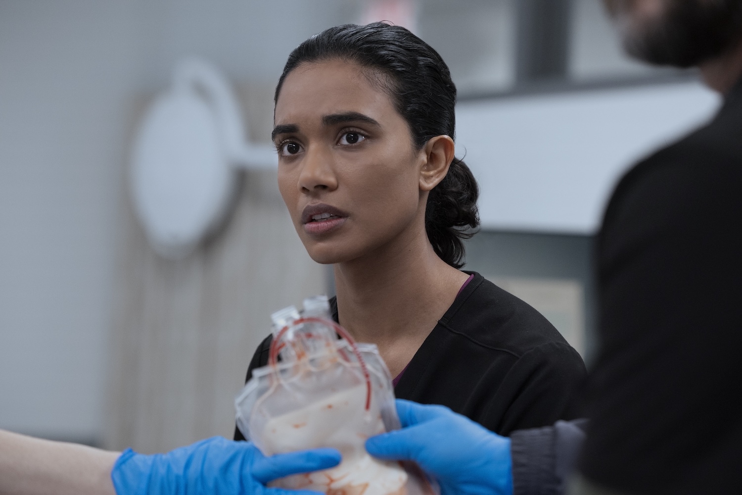 The Pitt Season 2 Episode 3 - Supriya Ganesh (Warrick Page/HBOMAX) | Tell-Tale TV Nancy is not welland needs to go to the OR.