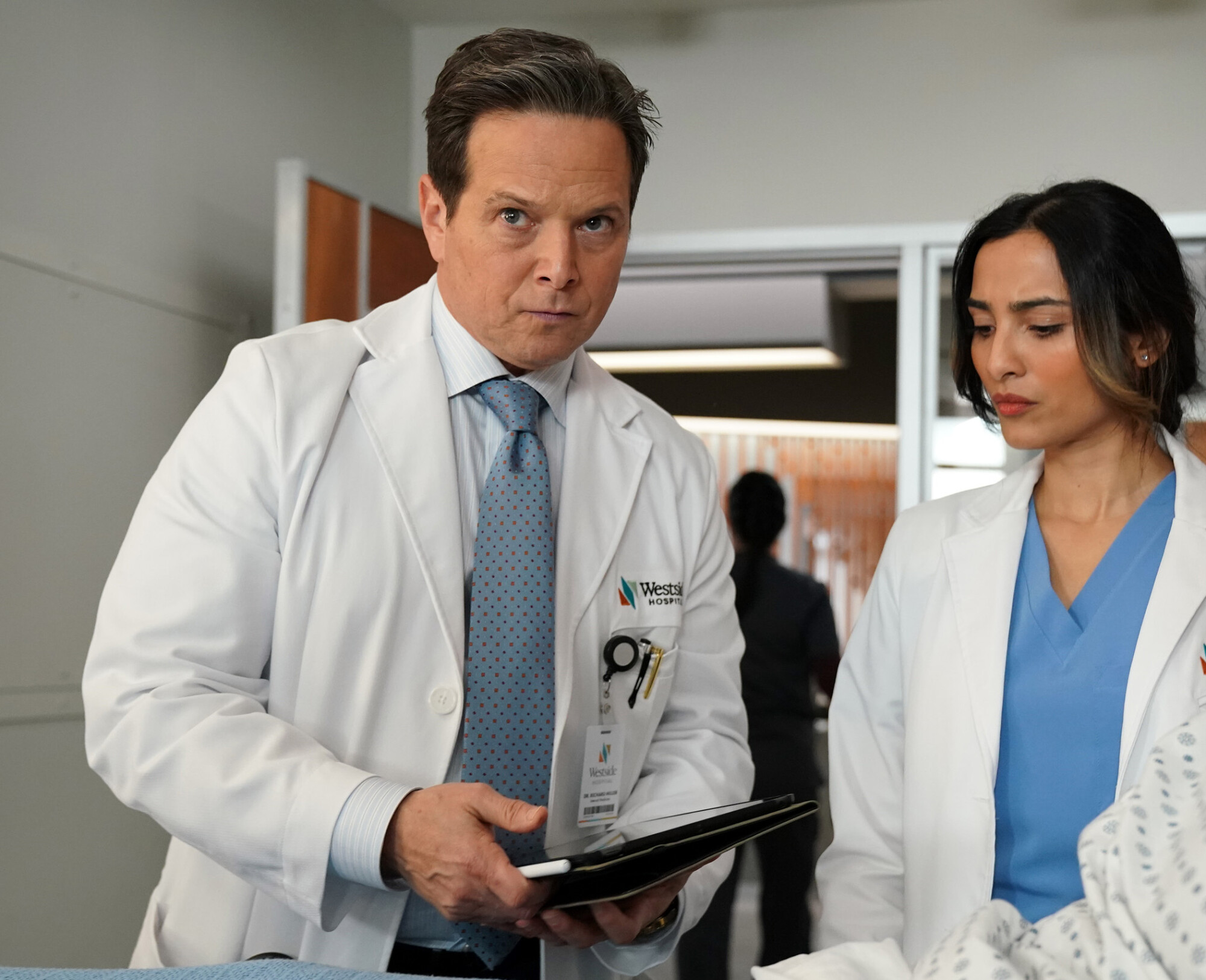 Still from Doc Season 2 Episode 16 of Scott Wolf and Anya Banerjee pictured from left to right. What to Expect from Doc Season 2 Episode 16: Best We Can Do Still from Doc Season 2 Episode 16 of Scott Wolf and Anya Banerjee pictured from left to right.