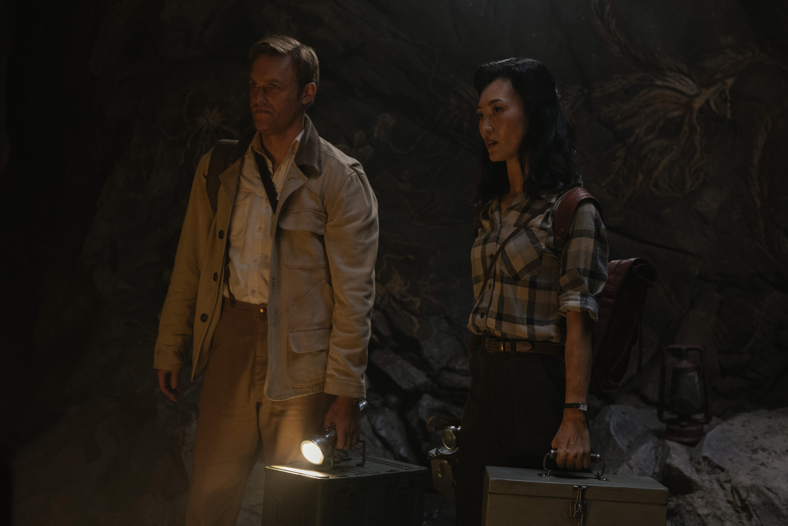 Monarch: Legacy of Monsters Season 2 Episode 1 - Wyatt Russell and Mari Yamamoto | Tell-Tale TV Still from Monarch: Legacy of Monsters Season 2 Episode 1 of Wyatt Russell and Mari Yamamoto pictured from left to right.