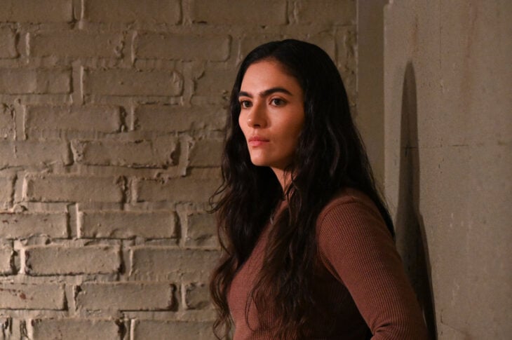 Closeup of Arienne Mandi as Eva Imani in an interrogation room.