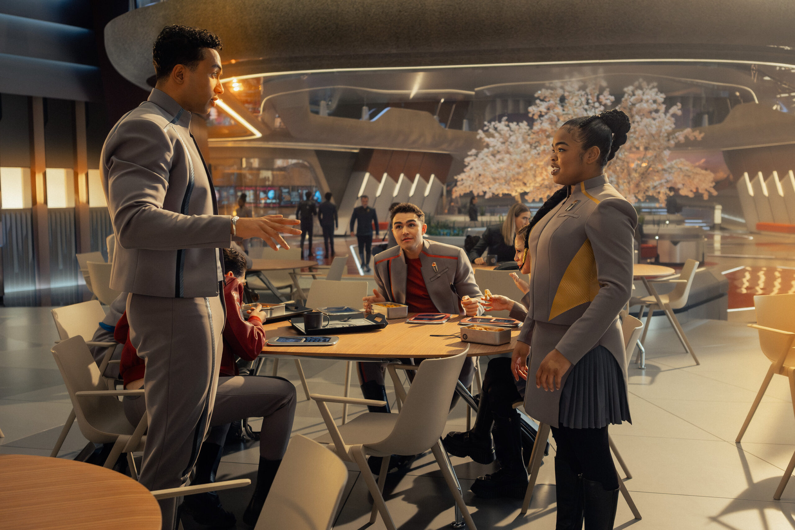 Still from Star Trek: Starfleet Academy Season 1 Episode 5, Series Acclimation Mil, of Sandro Rosta as Caleb, George Hawkins as Darem, and Kerrice Brooks as SAM pictured from left to right.