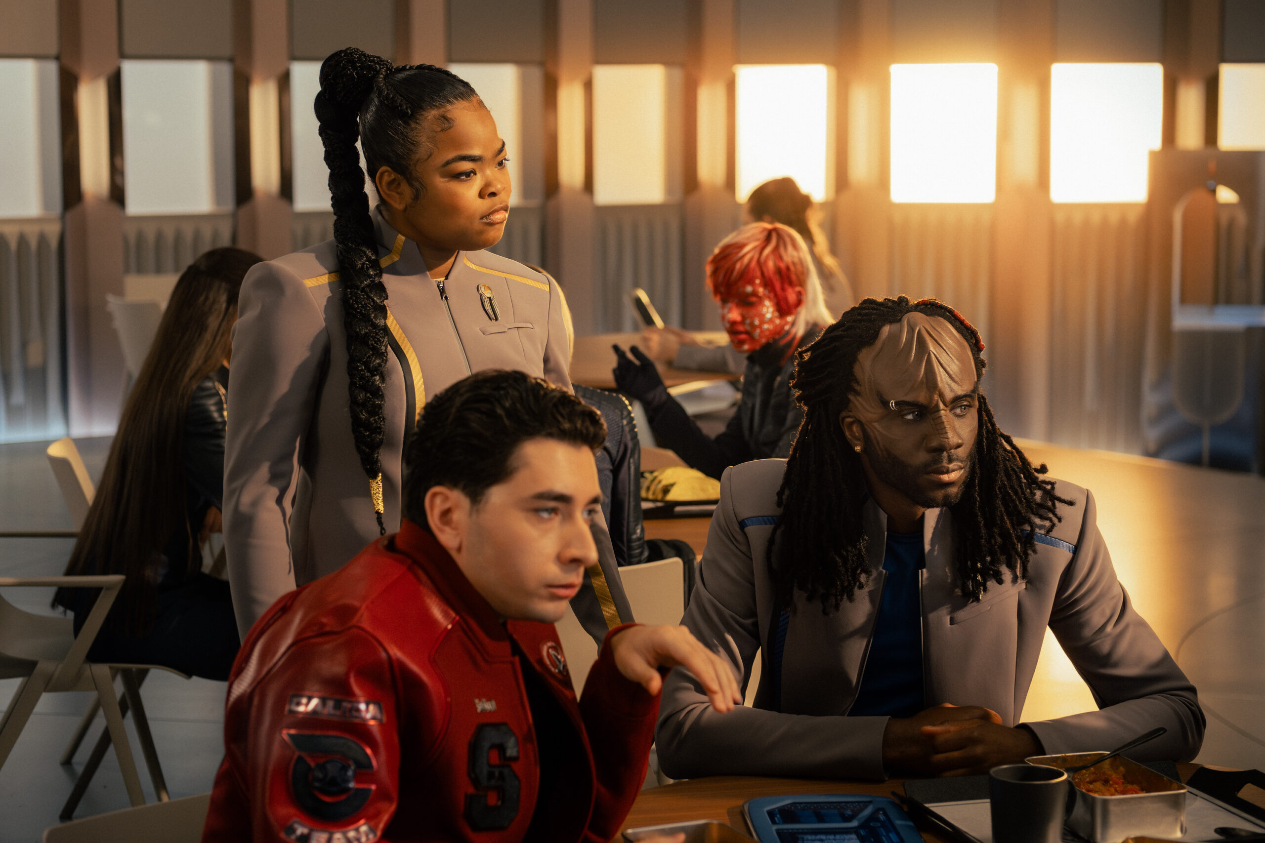 Still from Star Trek: Starfleet Academy Season 1 Episode 5 of Kerrice Brooks as SAM, Romeo Carere as Ocam, and Karim Diané as Jay-Den pictured from left to right.