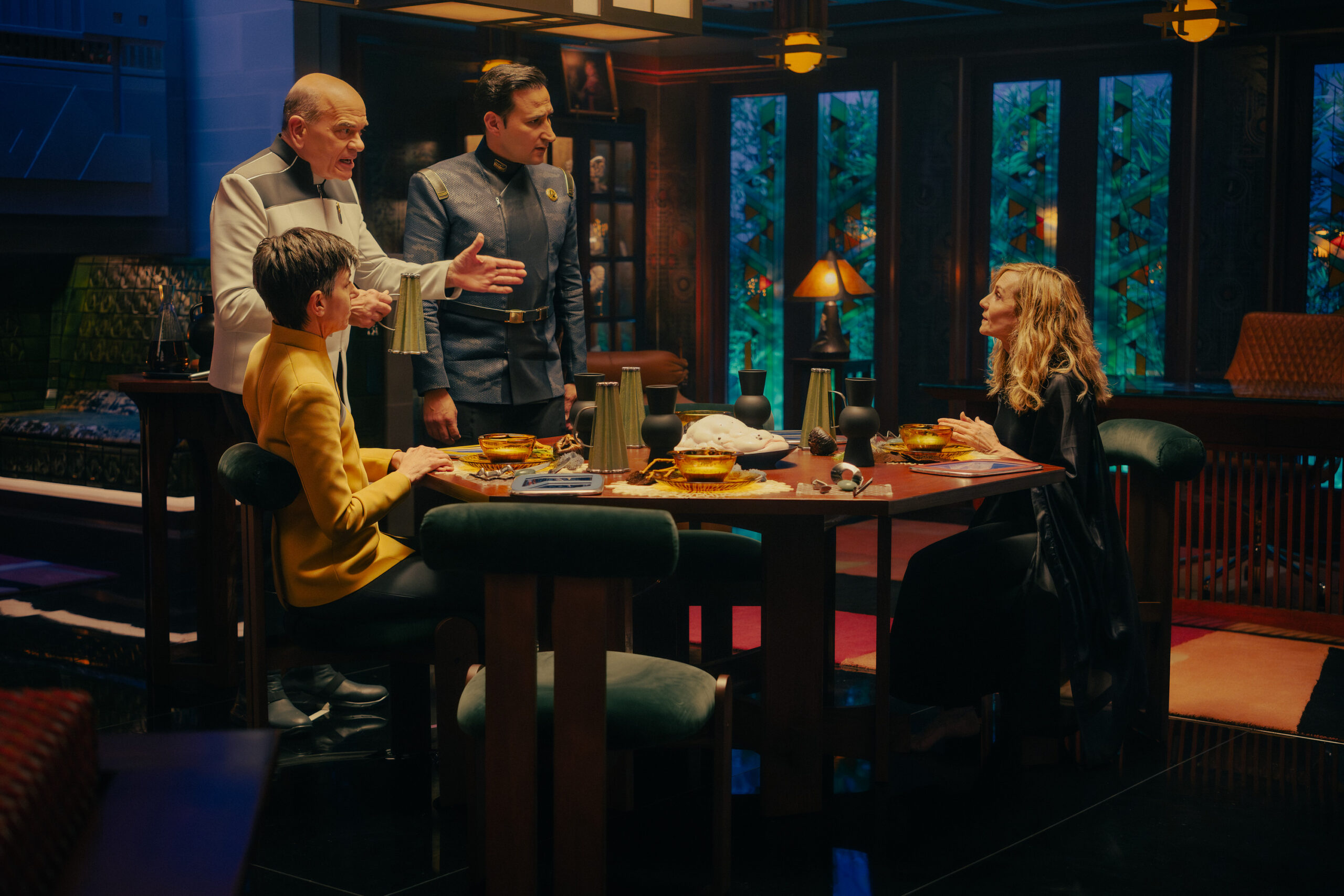 Still from Star Trek: Starfleet Academy Season 1 Episode 5 of Robert Picardo as The Doctor, Tig Notaro as Reno, Raoul Bhaneja as Commander Kelric, and Holly Hunter as Captain Nahla Ake pictured from left to right.