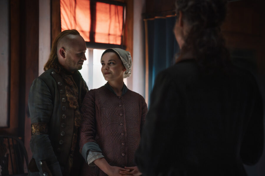 Outlander Season 8 - John Bell (“Young Ian”), Izzy Meikle-Small (“Rachel Hunter”), and Caitríona Balfe (“Claire Fraser”) (Photo courtesy of STARZ)