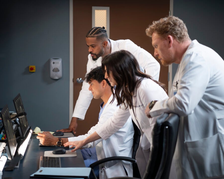 Grey's Anatomy Season 22 Episode 12 - doctors looking at scans - TREVOR JACKSON, NIKO TERHO, CATERINA SCORSONE, KEVIN MCKIDD