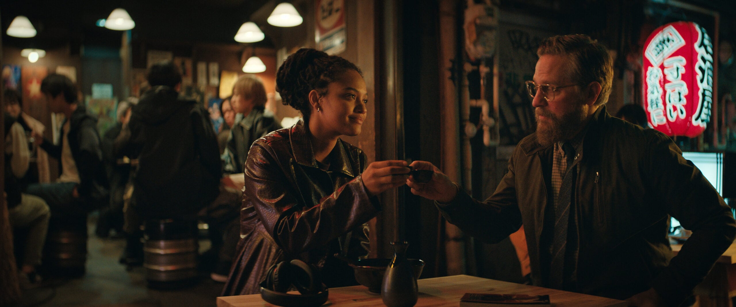 Still from Monarch: Legacy of Monsters Season 1 Episode 3 of Kiersey Clemons and Joe Tippett pictured from left to right.