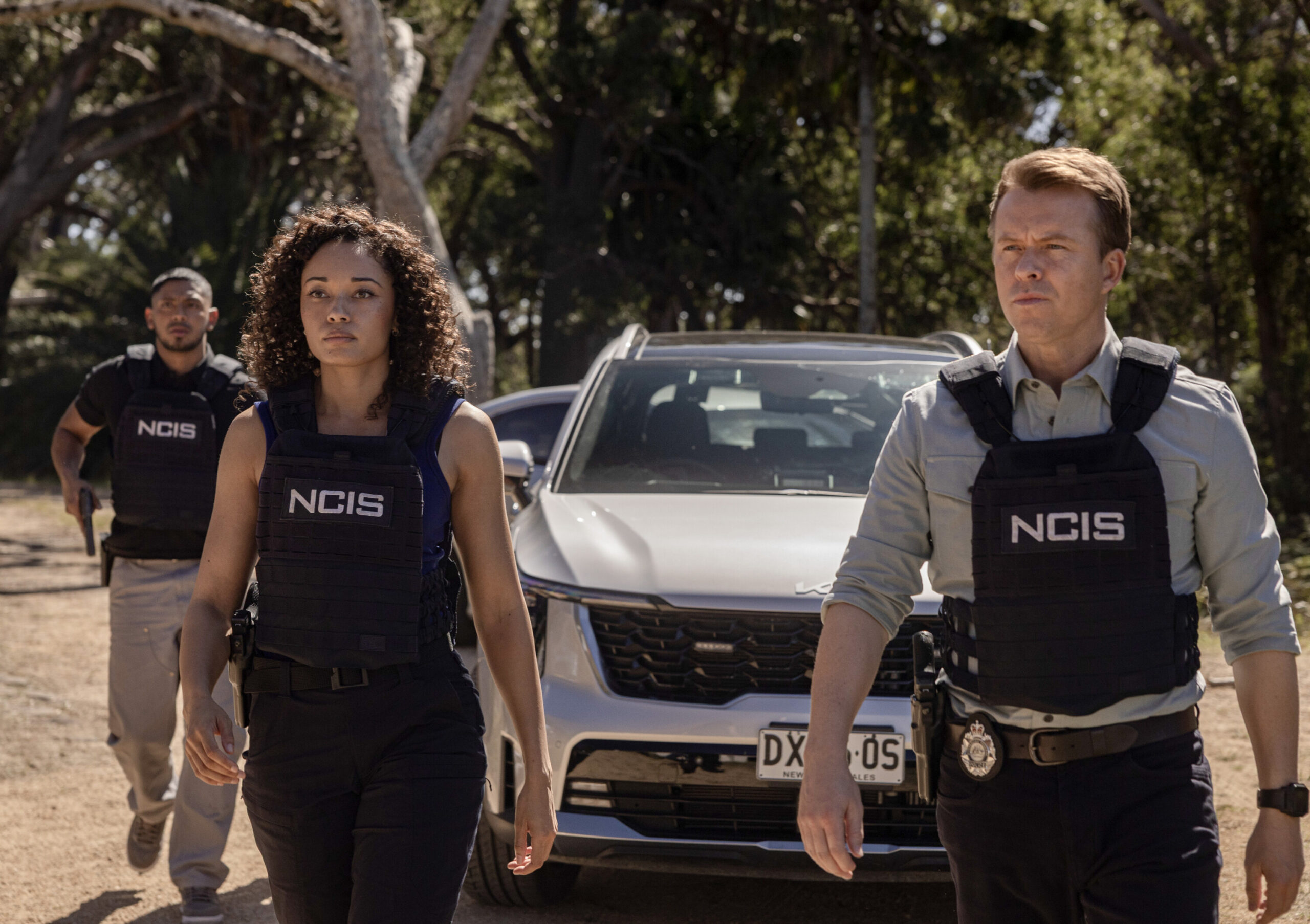 NCIS: Sydney Season 3 Episode 11, "Berthed" -- Sean Sagar as NCIS Special Agent DeShawn Jackson, Olivia Swann as NCIS Special Agent Captain Michelle Mackey and Todd Lasance as AFP Liaison Officer Sergeant Jim 'JD' Dempsey