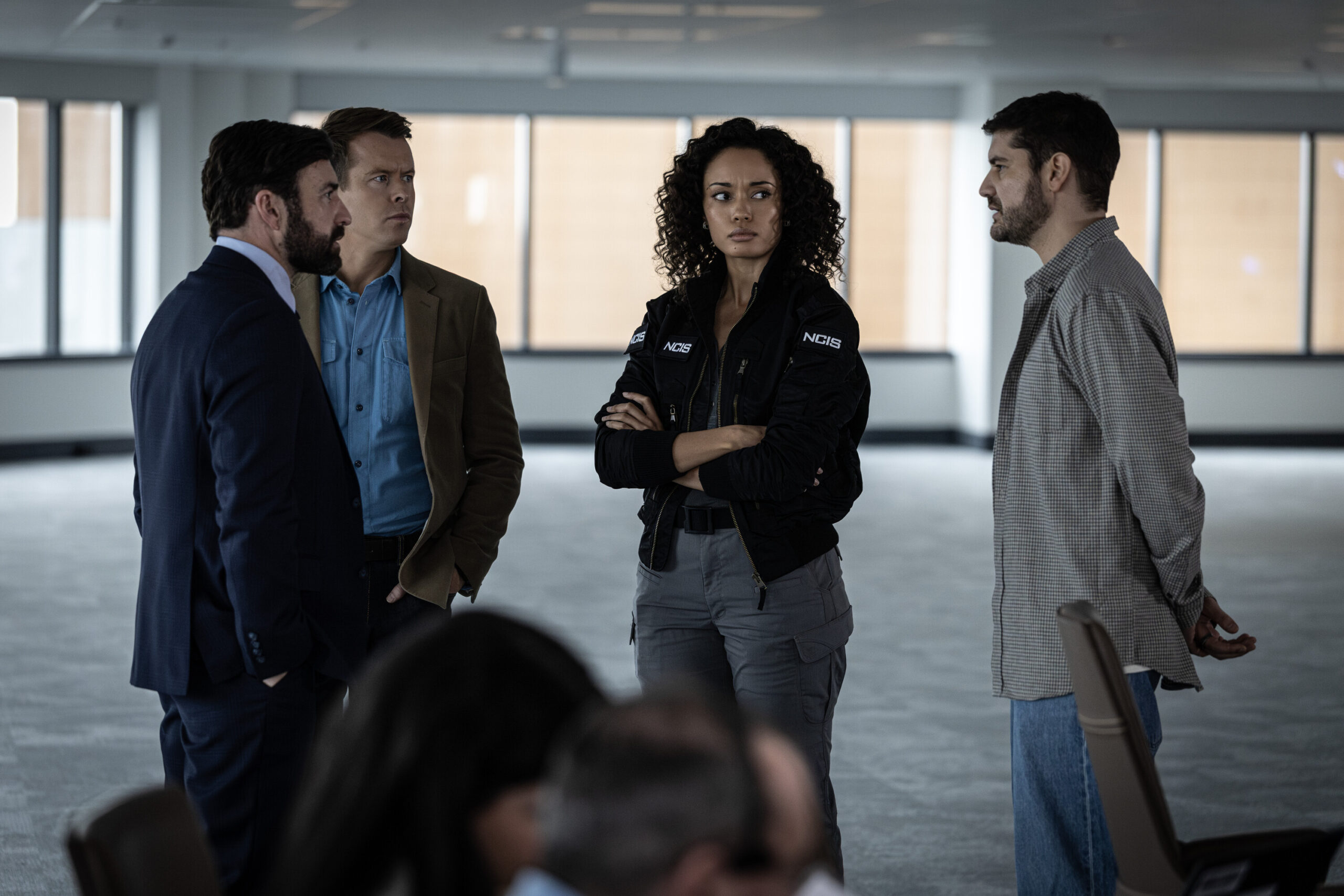 NCIS: Sydney Season 3 Episode 12, "Lone Wolf: Part One" -- Johnny Carr as Rory Latham, Todd Lasance as AFP Liaison Officer Sergeant Jim 'JD' Dempsey, Olivia Swann as NCIS Special Agent Captain Michelle Mackey, and Claude Jabbour as Travis “Trigger” Riggs