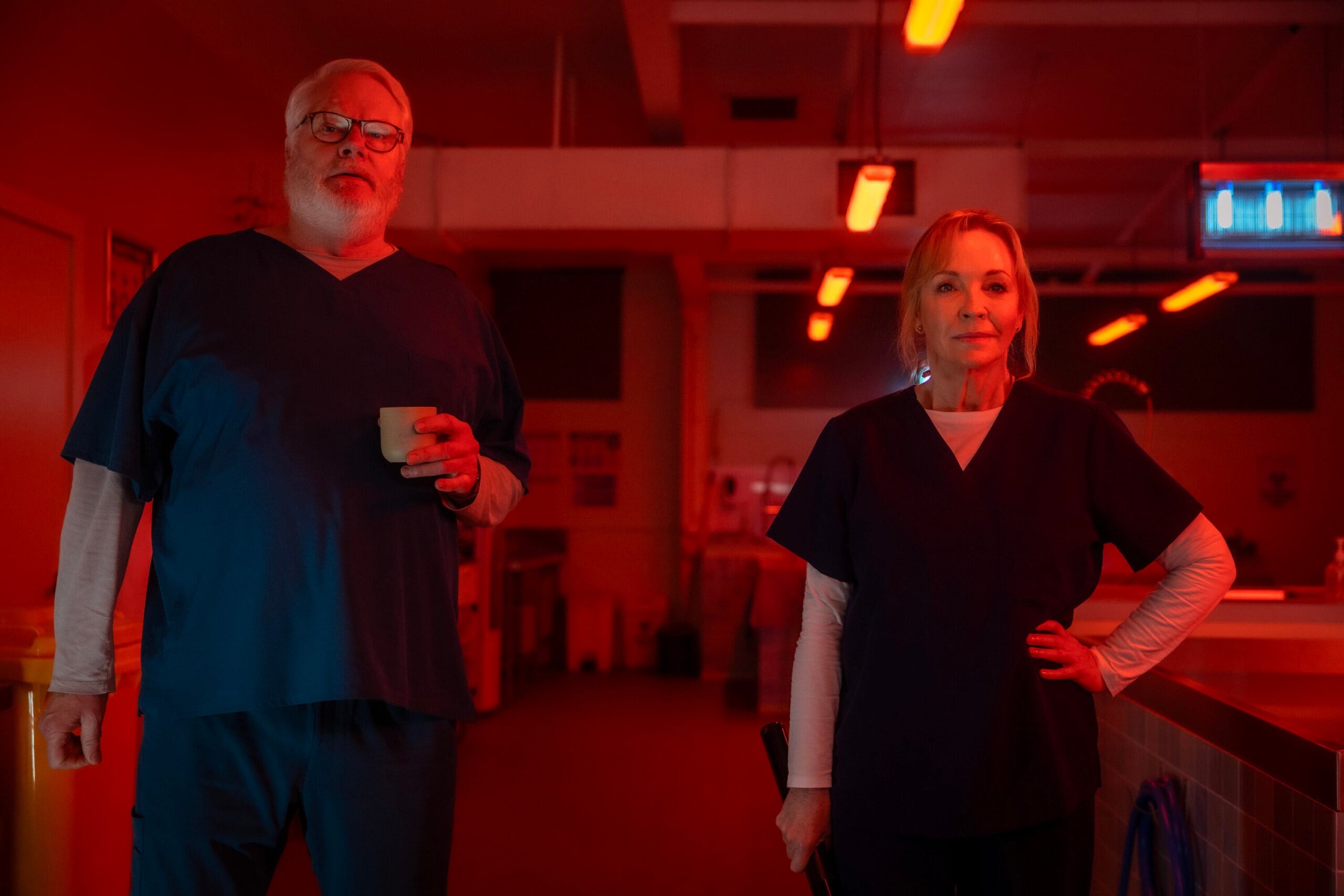 NCIS: Sydney Season 3 Episode 13, "Lone Wolf: Part Two" -- William McInnes as Forensic Pathologist Dr. Roy Penrose and Rebecca Gibney as Nia Williams