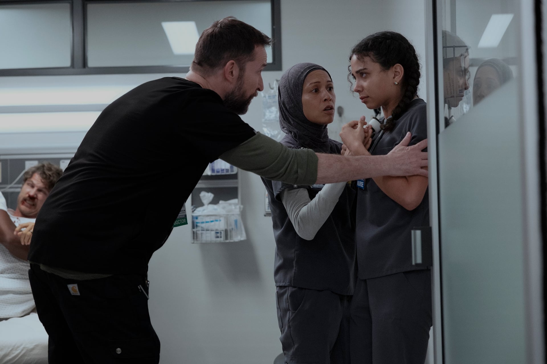 The Pitt Season 2 Episode 12 — Noah Wyle, Amielynn Abellera, Laëtitia Hollard (Photograph by Warrick Page/HBO Max)